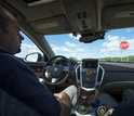 Man inside a driverless car
